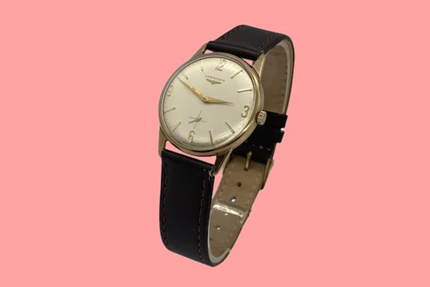 Image of vintage watch on Pink Hero background