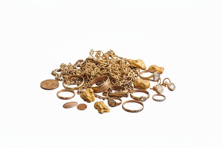 pile of scrap gold items
