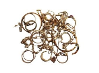 How is gold weighed? image